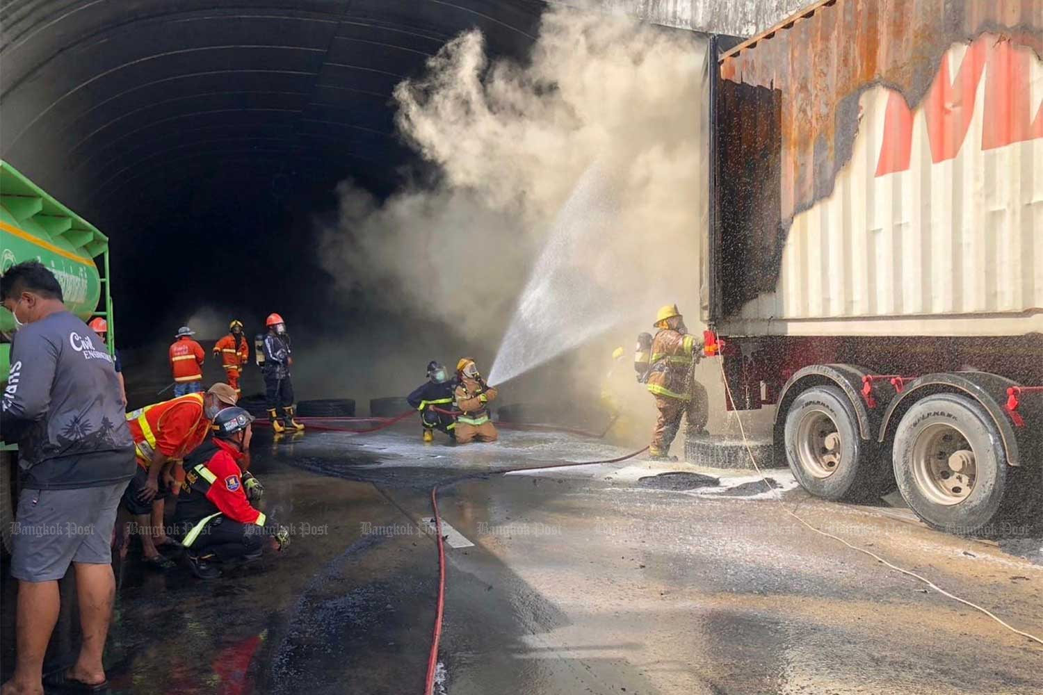 Firemen douse the fire that destroyed a trailer truck in Na Di district of Prachin Buri late on Thursday night. (Photo: Noo May Sawang Sa Kaeo rescue team)