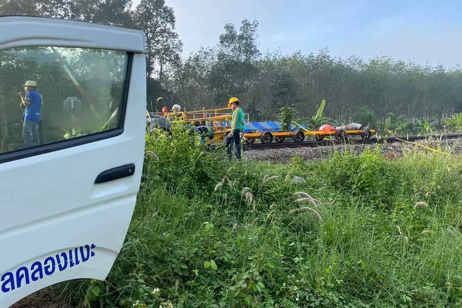 Railway workers are seen at the site of a repeat bombing on Tuesday morning. Three workers were killed and four injured while salvaging a freight train damaged by a Saturday bombing in Sadao district of Songkhla province. (Photo: Abdullah Benjakat)