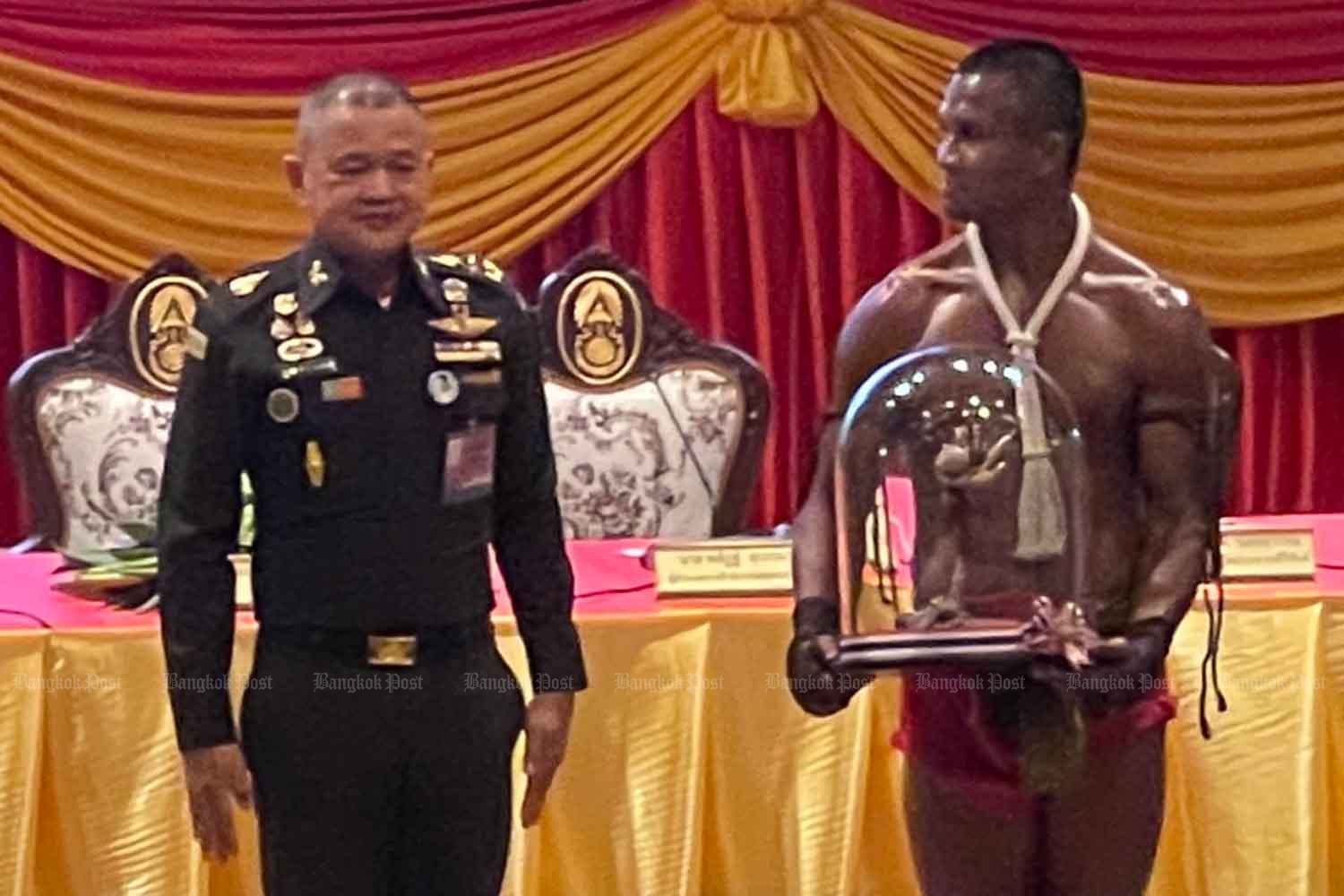 Army chief Gen Narongpan Jitkaewthae, left, is present with famous Muay Thai boxer Sombat "Buakaw" Banchamek during a press conference on the Amazing MuayThai Festival 2023, at the army headquarters in Bangkok on Wednesday. (Photo: Wassana Nanuam)