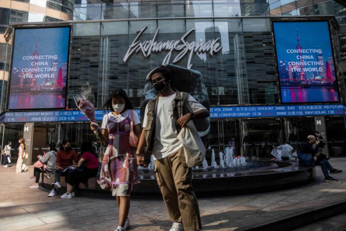 Bangkok Post - Asian markets extend US rally after inflation boost ...