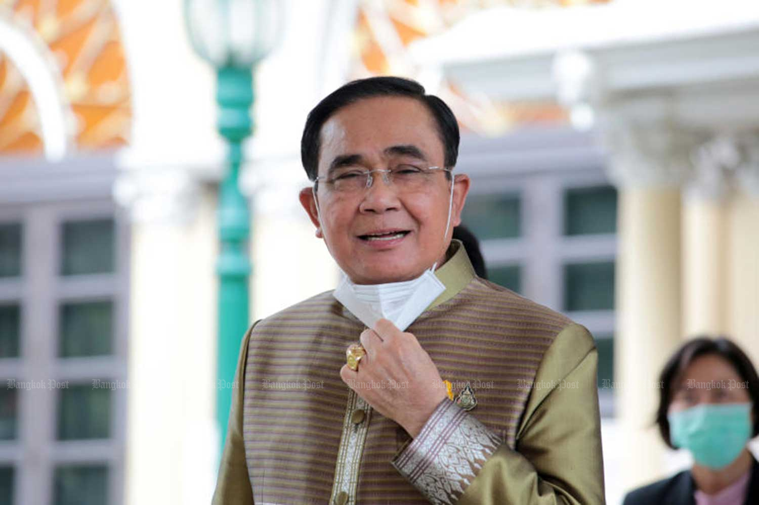 Prime Minister Prayut Chan-o-cha greets reporters after a cabinet meeting in November. (File photo: Chanat Katanyu)