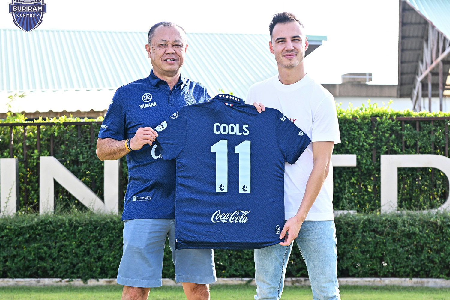 Buriram’s new signing Dion Cools, right, poses with club chairman Newin Chidchob.