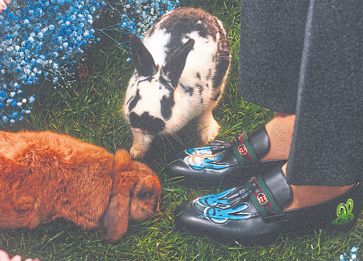 Men’s loafers with neon bunny motifs.