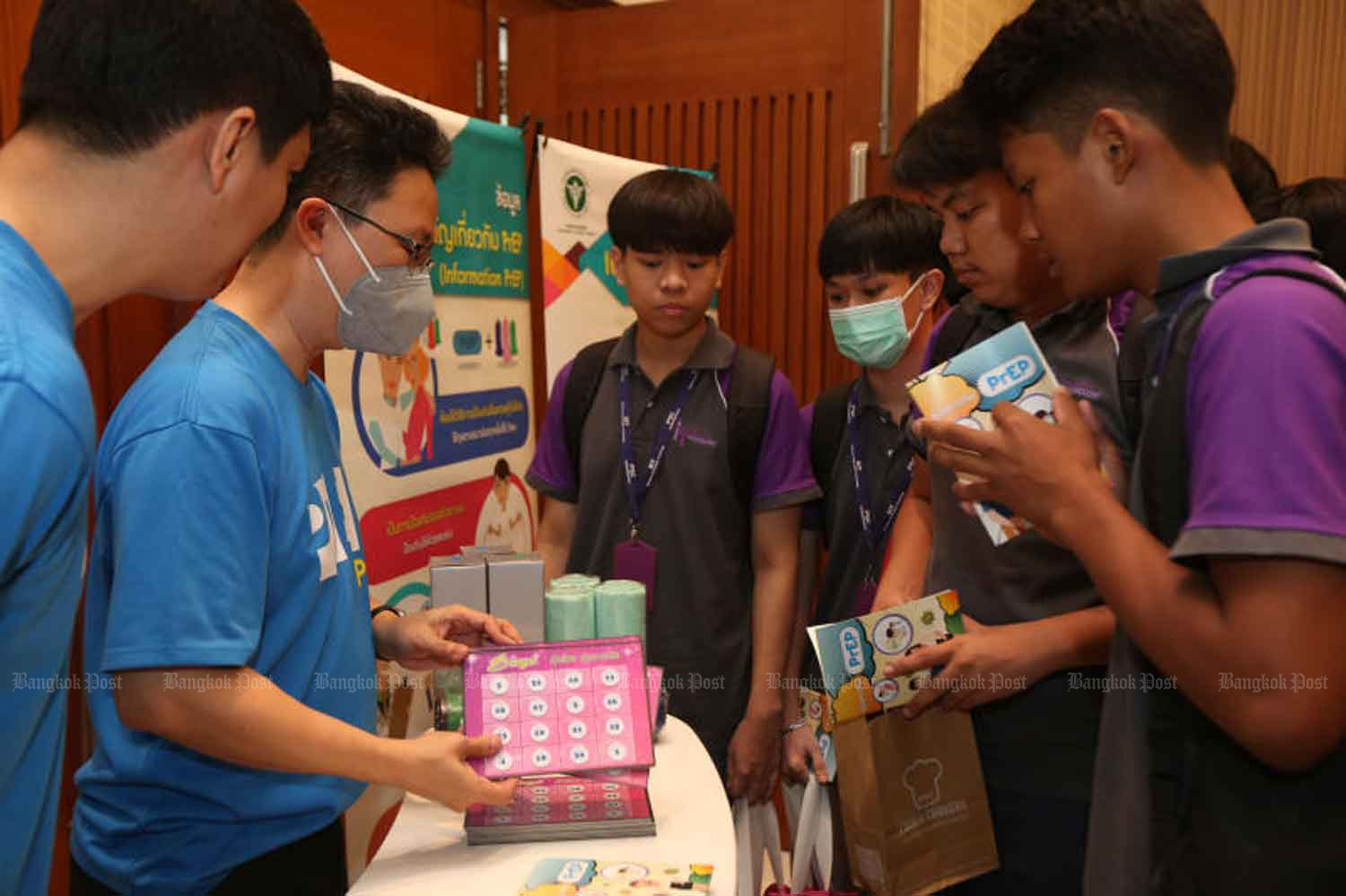 Condoms are given away at Pongsawadi Technological College in Nonthaburi province on the eve of Valentine’s Day in 2020 in a campaign to encourage youngsters to cut down on drinking and avoid unsafe sex. (Photo: Varuth Hirunyatheb)