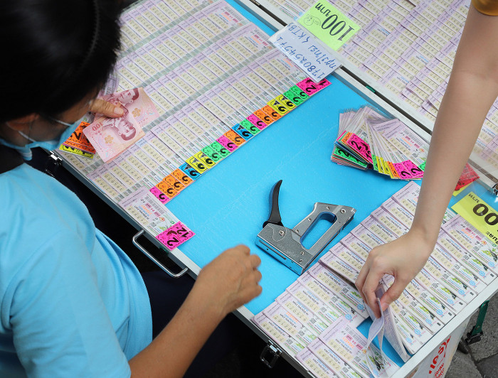Bangkok Post Act fast on lottery sets