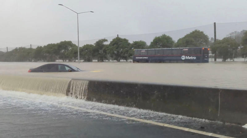 Stranded vehicles are seen during heavy rainfall in Auckland, New Zealand, in this screen grab obtained from a social media video on Friday. (Photo: Reuters)