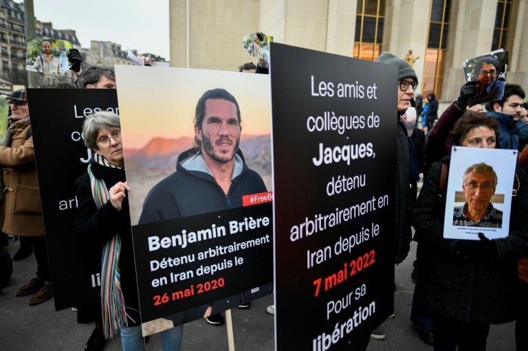 'Unbearable distress': families rally for French held in Iran