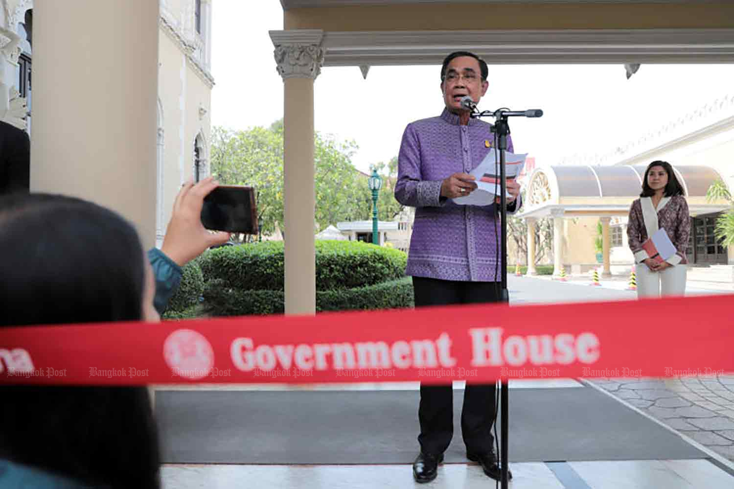 Prime Minister Prayut Chan-o-cha speaks to reporters at Government House on Tuesday. (Photo: Chanat Katanyu)