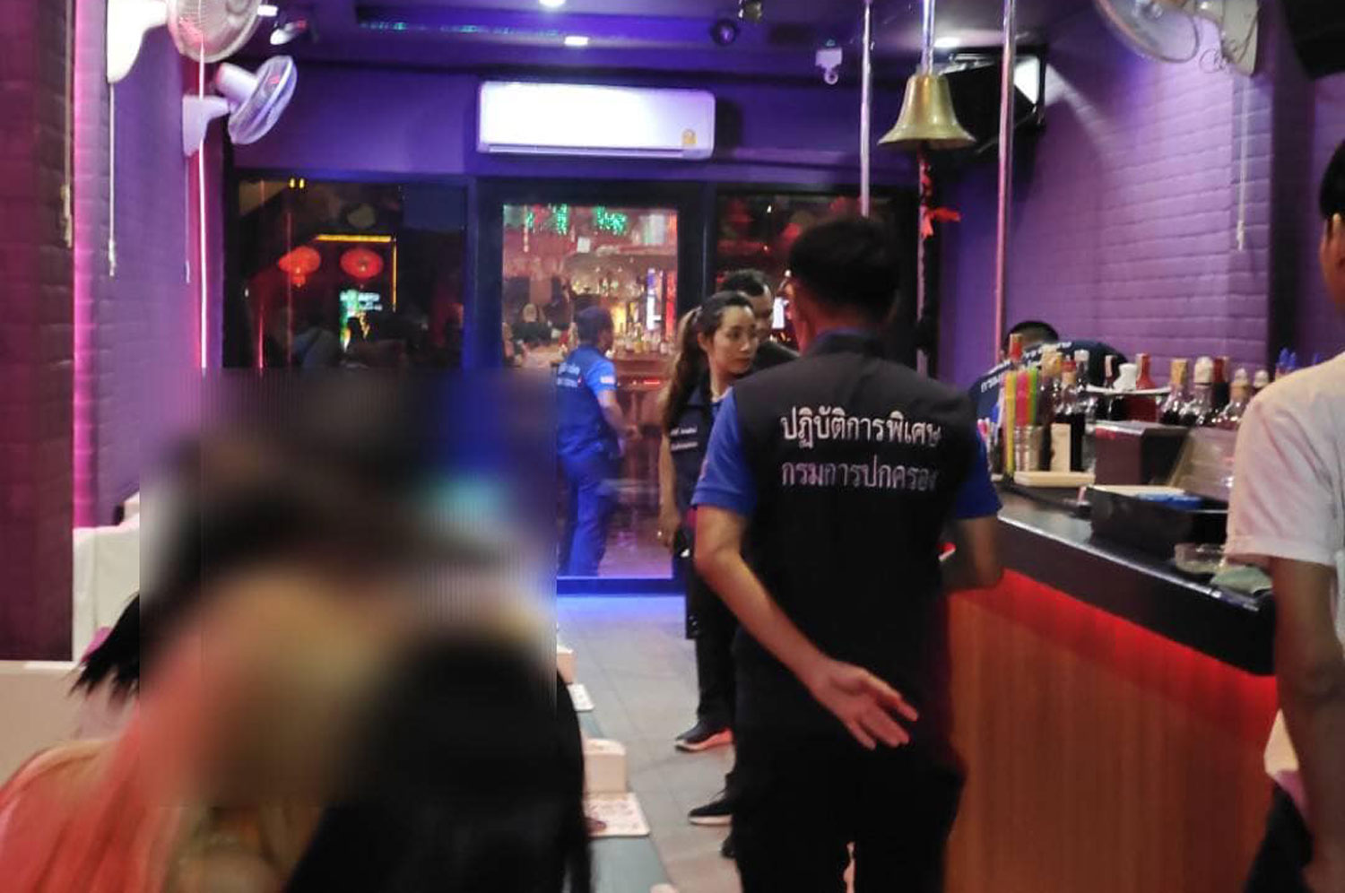 A task force from the Department of Department of Provincial Administration (DOPA) raided Velvet bar on Bangla Walking Street in Phuket on Wednesday night. (Photo: DOPA's law enforcement centre)