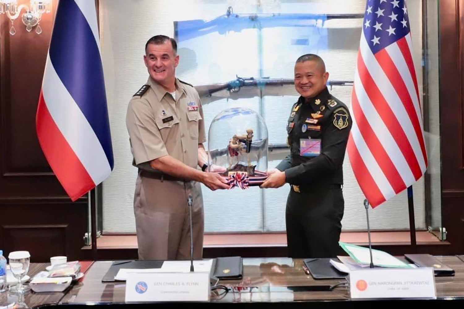 Army chief Gen Narongphan Jitkaewtae, right, welcomes USARPAC commanding general Charles Flynn at Royal Thai Army headquarters on April 18. (Army photo)