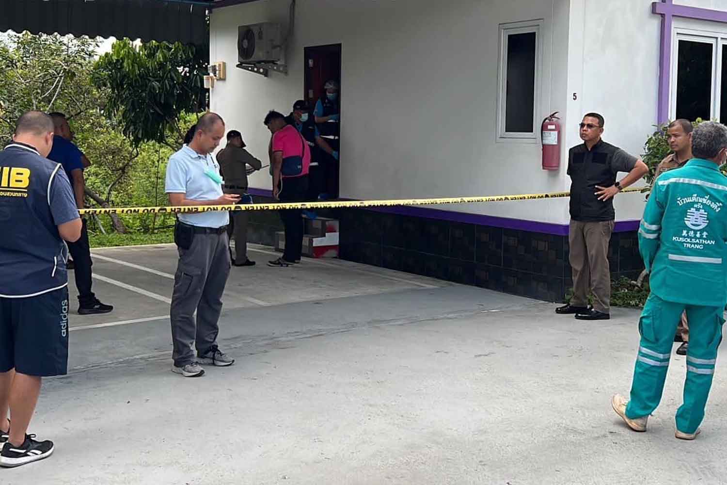 Police and rescue workers at the crime scene in Muang district of Trang on Tuesday. (Photo: Kusolsathan Foundation)