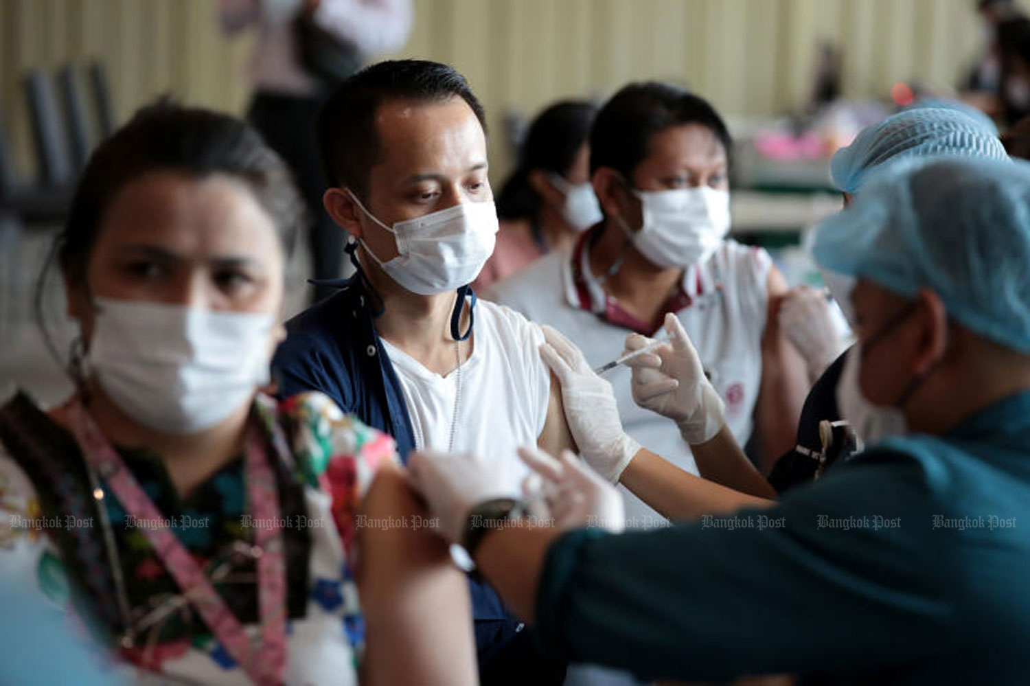 People get Covid-19 vaccine shots at Parliament's reception hall on May 11. (Photo: Chanat Katanyu)