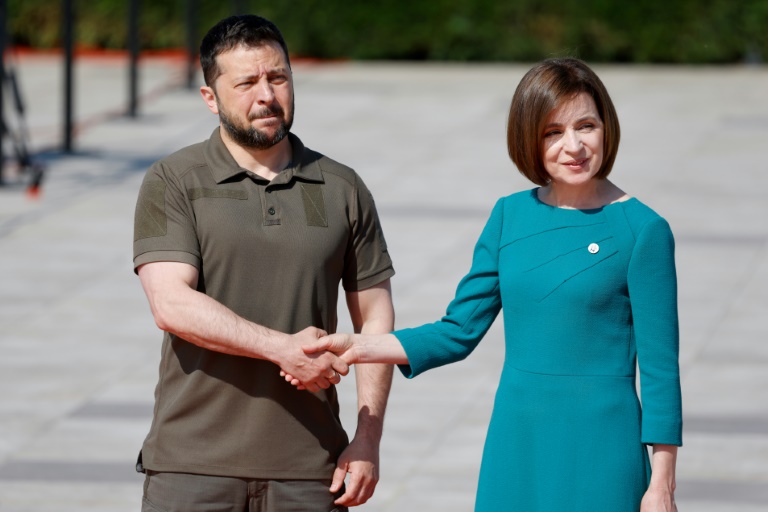 Moldovan President Maia Sandu welcomes Ukraine President Volodymyr Zelensky to a summit of European leaders held just 20km from the Ukraine border on Thursday. (Photo: AFP)