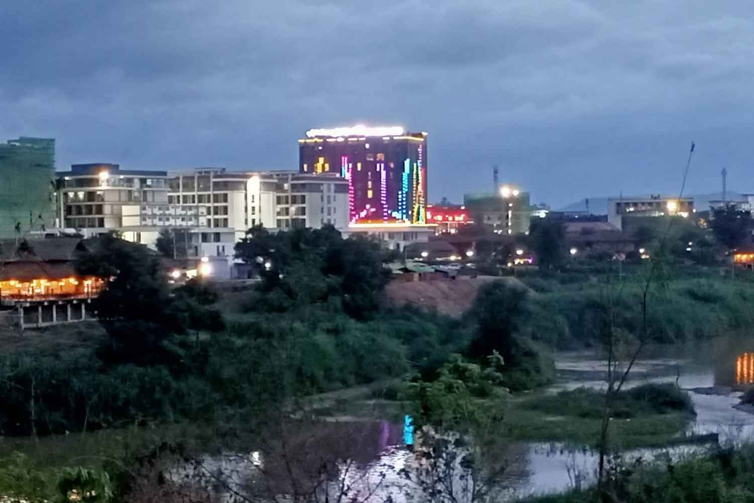 Shwe Kokko, a Myanmar border town across the Moei river opposite Ban Wang Pha in Tak's Mae Ramat district of Thailand, with the lights still on. (Photo: Assawin Pinitwong)