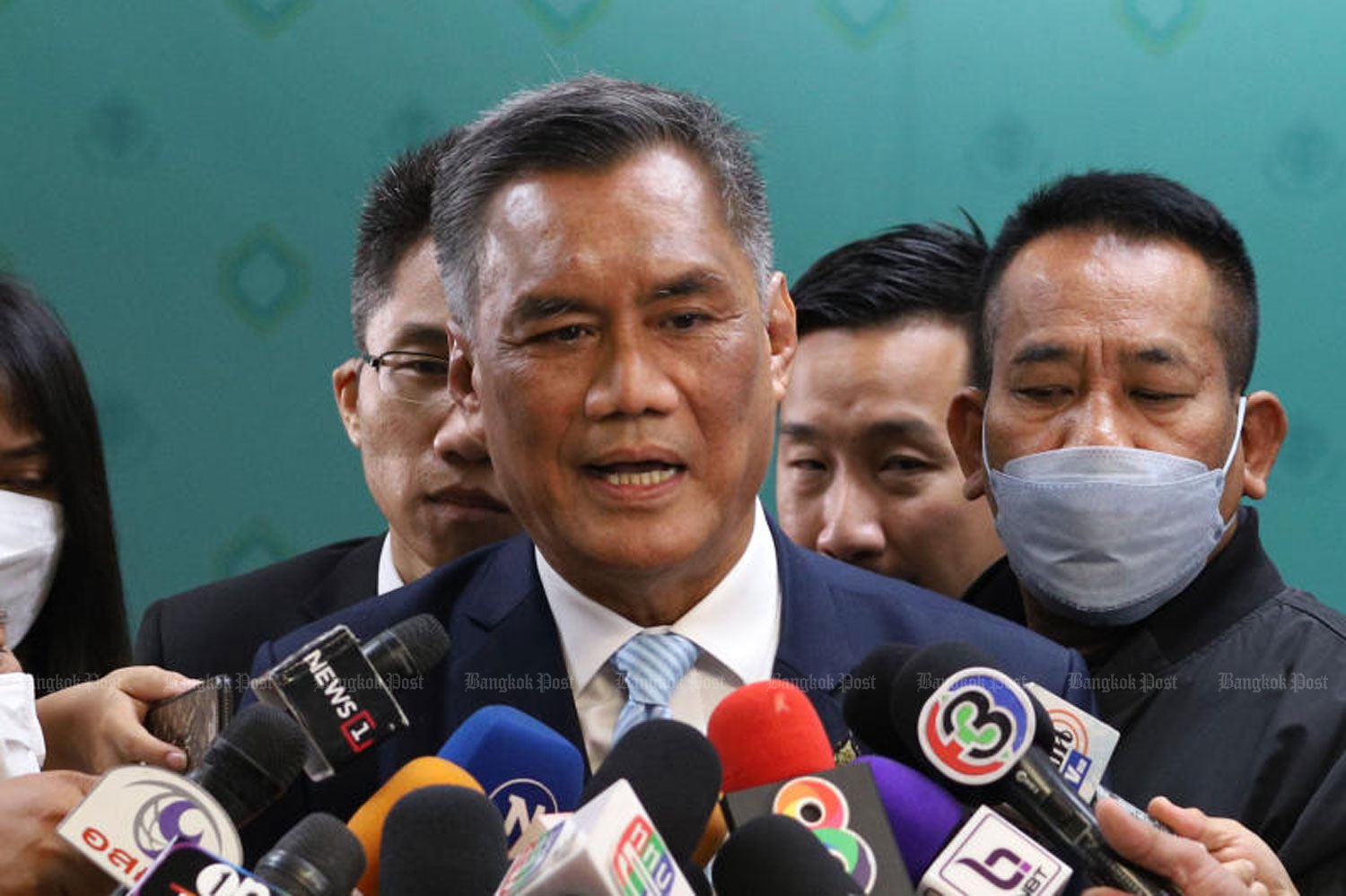 Election Commission (EC) chairman Ittiporn Boonpracong speaks to reporters after a ritual and merit-making ceremony at the Government Complex on Chaeng Wattana Road on Friday, where the EC headquarters is located, to mark the body's 25th anniversary. (Photo: Pattarapong Chatpattarasill)