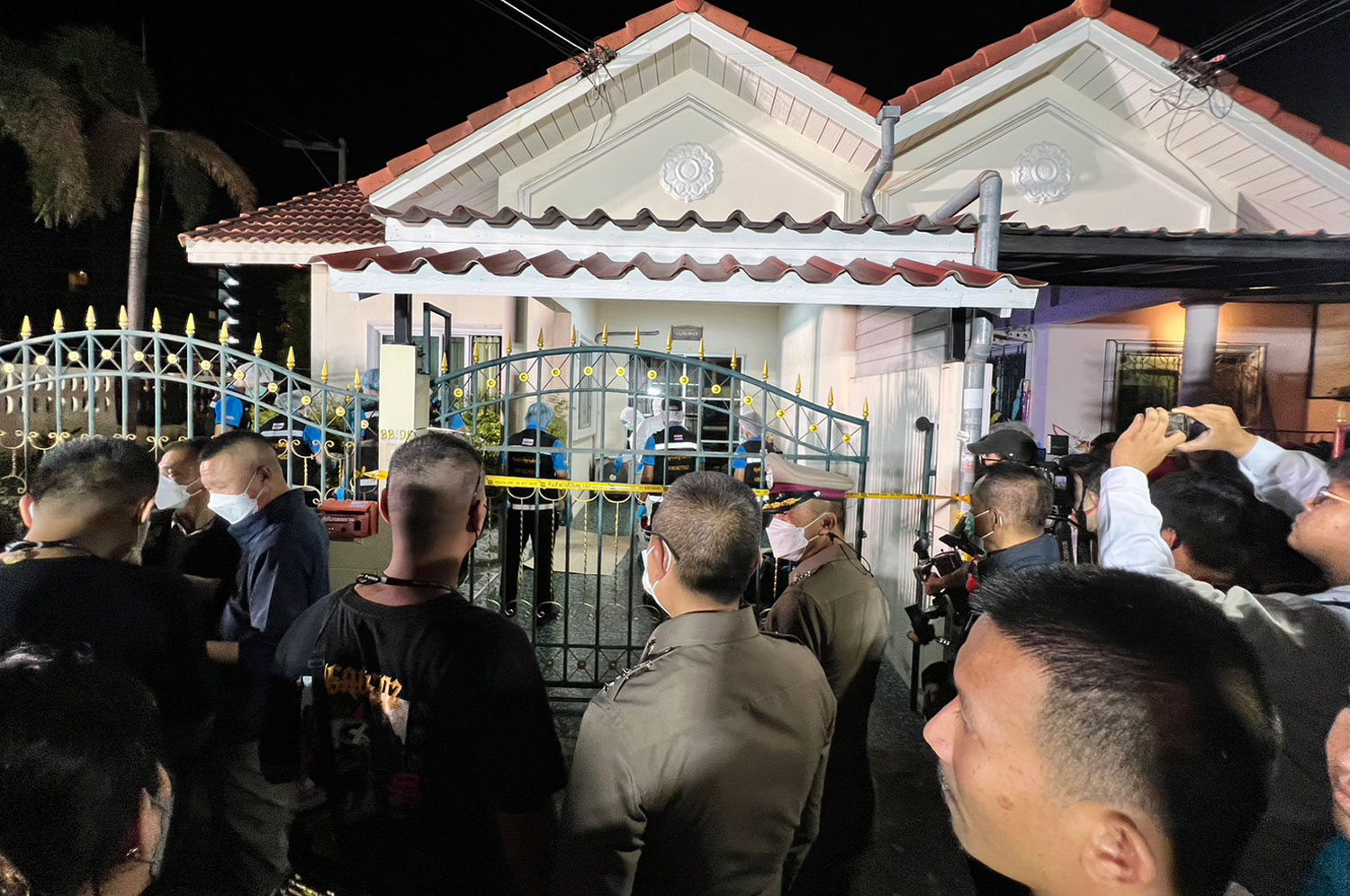 Police cordon off a house where the body of missing German property broker Hans Peter Mack was found in a freezer, in tambon Nong Prue of Bang Lamung district in Chon Buri. (Photo: Chaiyot Pupattanapong)