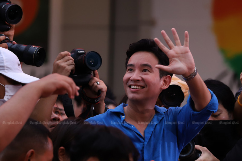 Pita Limjaroenrat, the Move Forward Party leader and prime ministerial candidate, greets supporters during a rally at CentralWorld in Bangkok on Sunday. (Photo: Wichan Charoenkiatpakul)