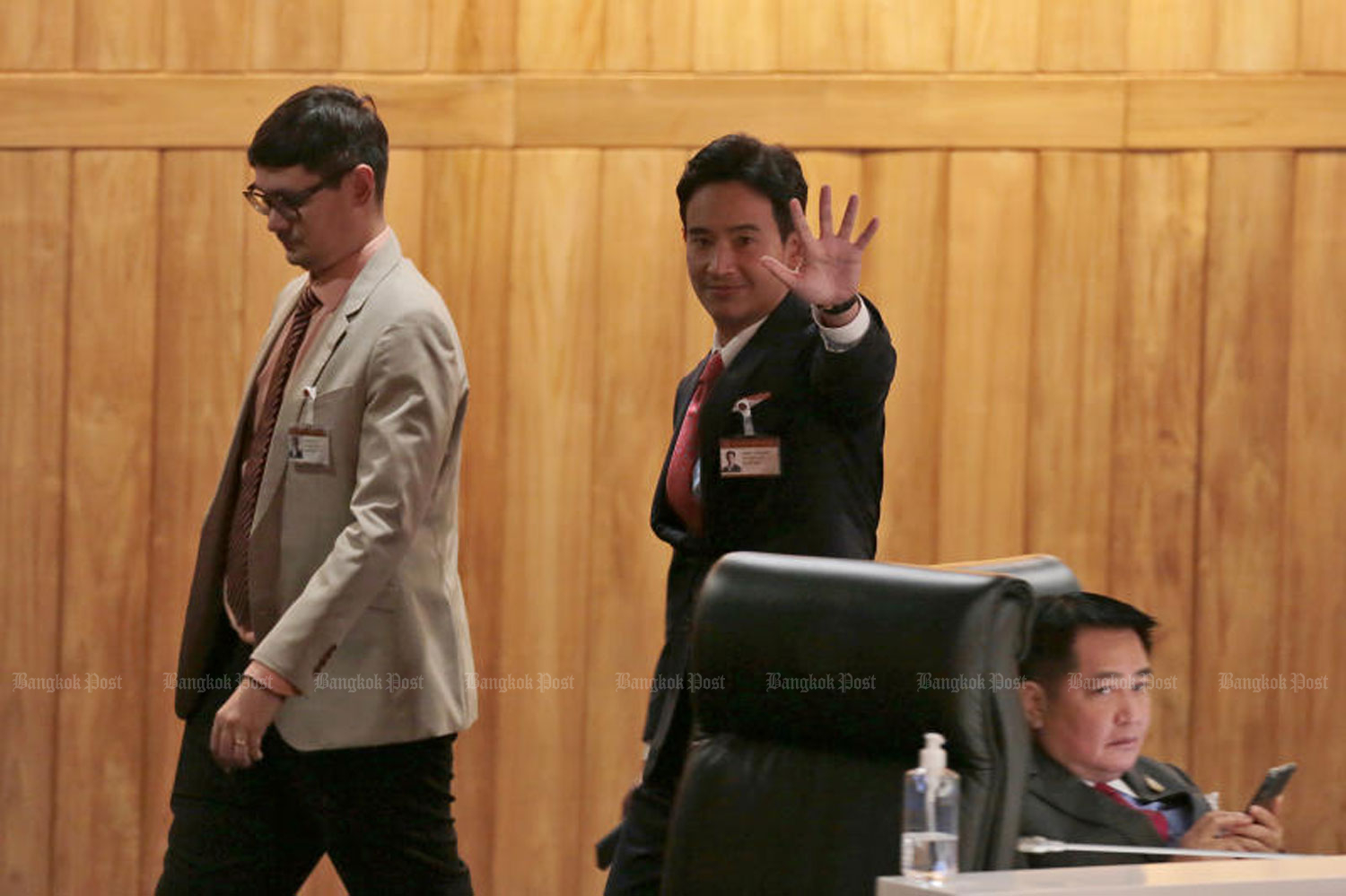 Pita Limjaroenrat, leader of the election-winning Move Forward Party (MFP) leader, right, and MFP-list MP Rangsiman Rome, left, leave the parliament on July 13 after Mr Pita, the sole prime ministerial candidate, failed to gather enough support in a joint sitting of elected MPs and appointed senators to become the country's 30th prime minister. (Photo: Chanat Katanyu)