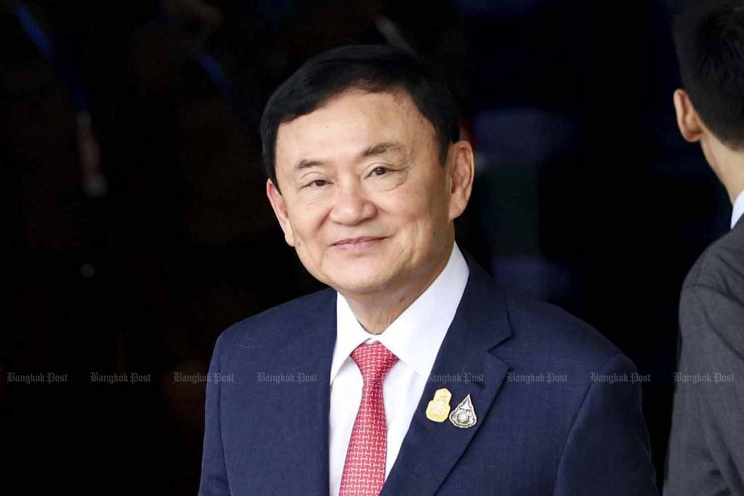 Thaksin: Pardoned after return