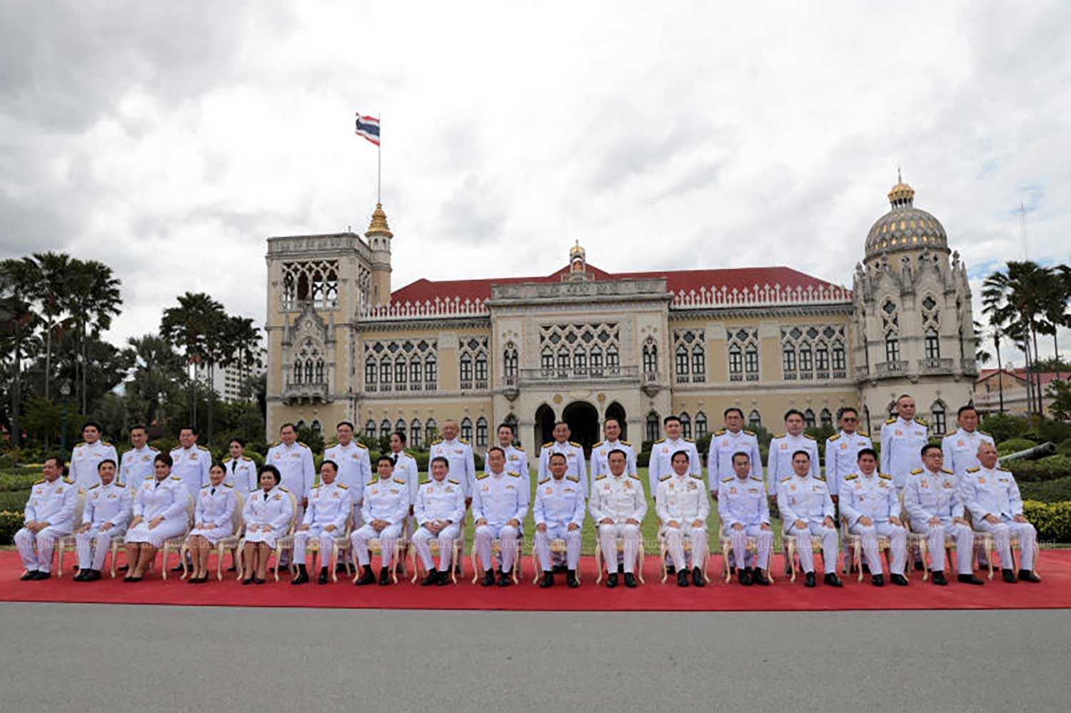 Cabinet members led by Prime Minister Srettha Thavisin, seated, ninth from right, pose at  Government House before taking their oaths of office in front of Their Majesties the King and Queen at Dusit Palace on Tuesday. (Photo: Chanat Katanyu)