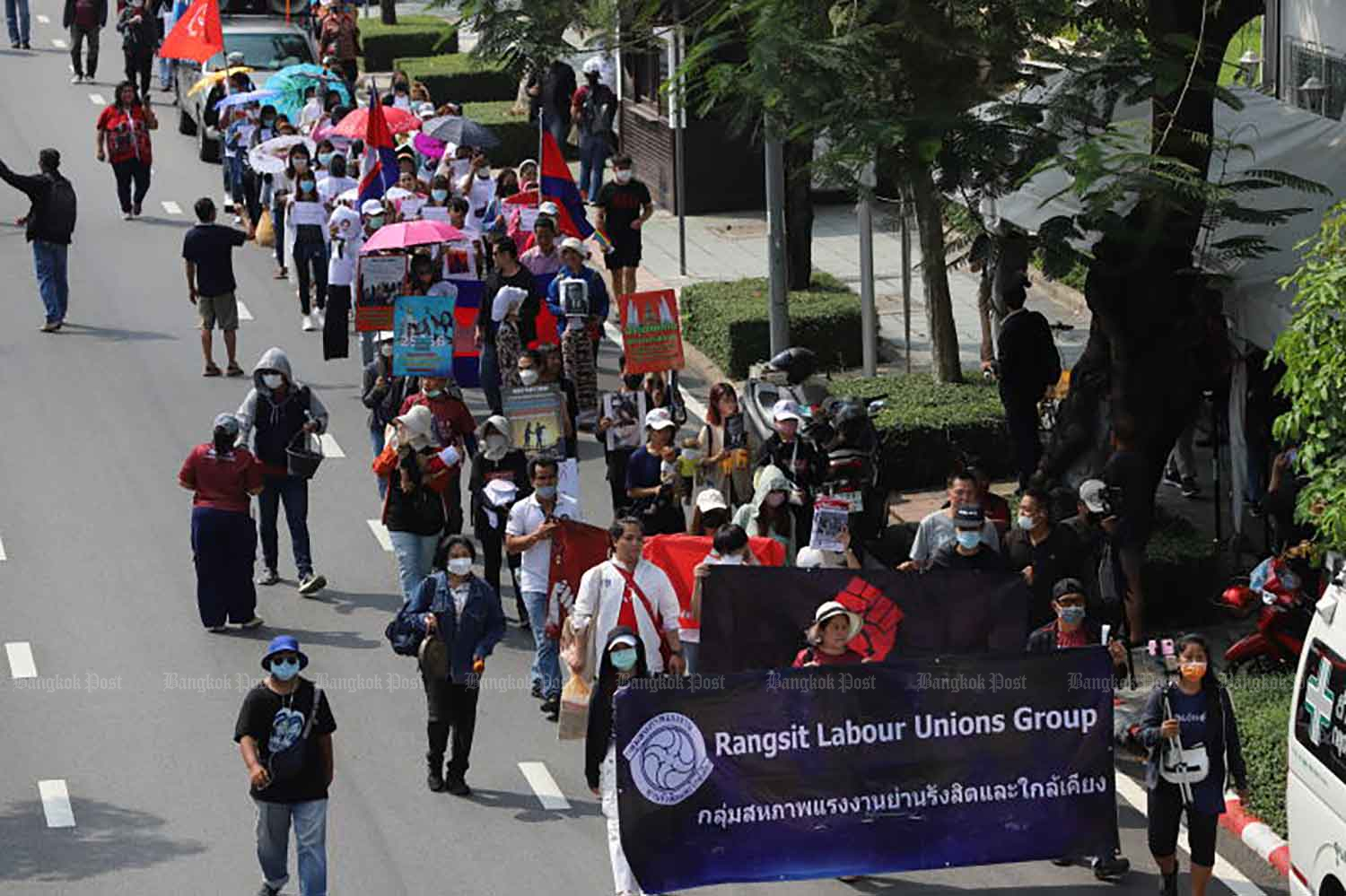 Workers hold a May Day parade from the Democracy Monument to Government House to highlight their cause, on May 1. (Photo: Wichan Charoenkiatpakul)