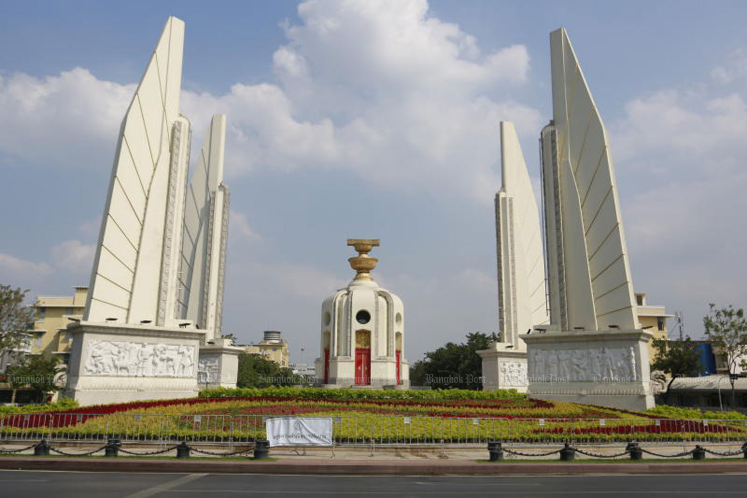 Democracy Monument is seen after the Bangkok Metropolitan Administration spruced up the area surrounding it with flowers on Feb 11, 2021. (File photo)