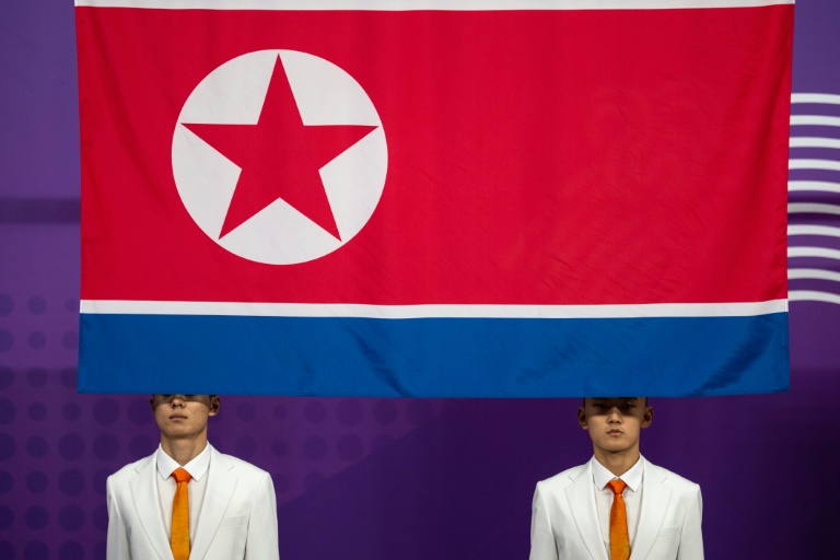 The North Korean flag is hoisted during a medal ceremony at the Asian Games.