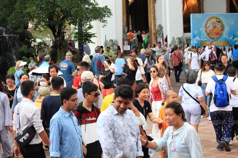 Thai and foreign tourists visit Wat Pho, a Buddhist temple complex in the Phra Nakhon District, Bangkok, on Oct 22, 2023. (Photo: Apichart Jinakul)