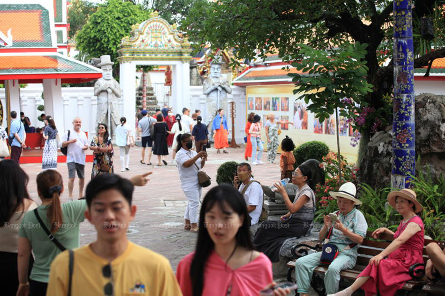 Tourists visit Wat Pho, or the Temple of the Reclining Buddha in Bangkok on Oct 22. Thailand welcomed more than 22 million foreign tourists in the first 10 months of this year. (Photo: Apichart Jinakul)