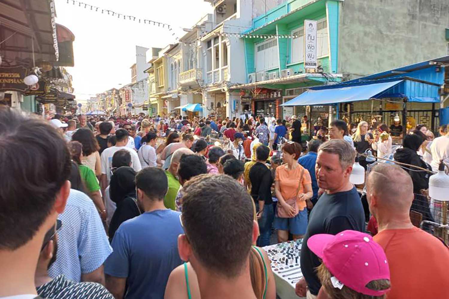 The walking street in the Old Town area in central Phuket is clogged with visitors on Sundays. (Photo: Achadthaya Chuenniran)