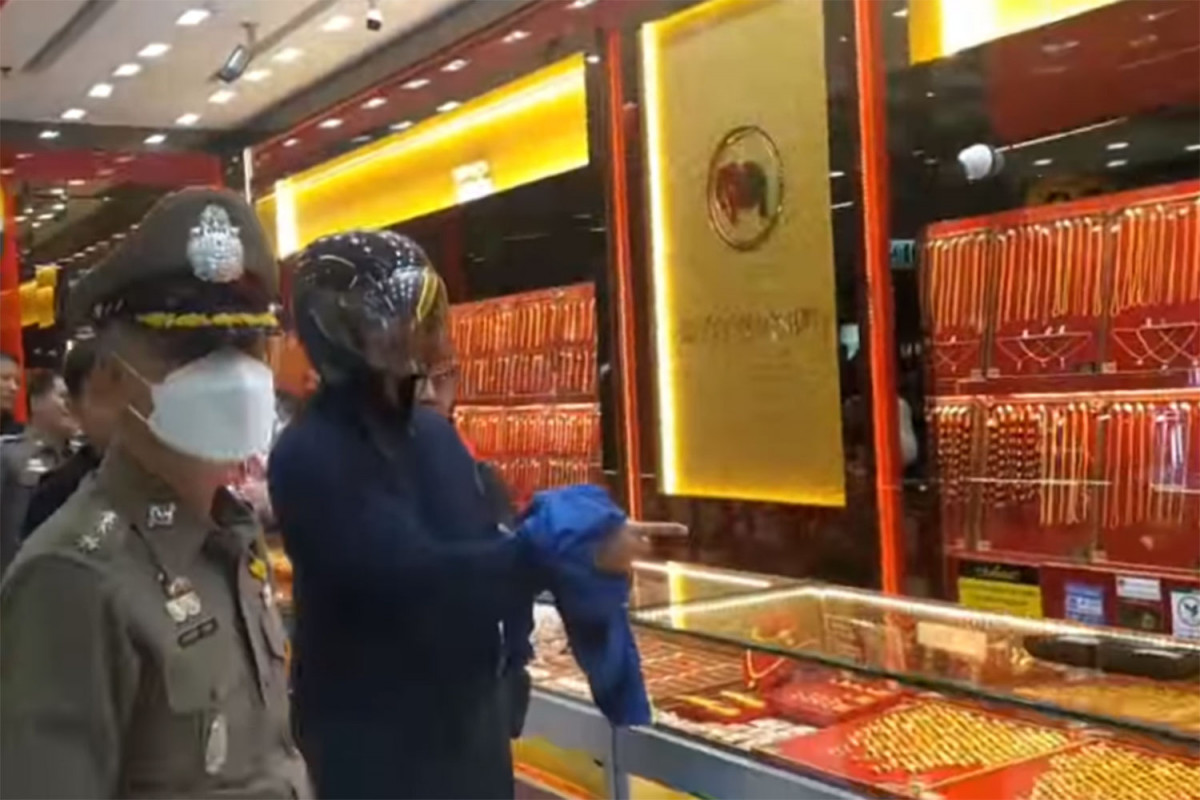 Bangkok Post - Gold robber betrayed by brand-name shoes