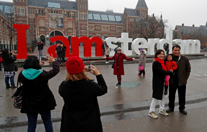 Amsterdam bans new hotels to curb mass tourism