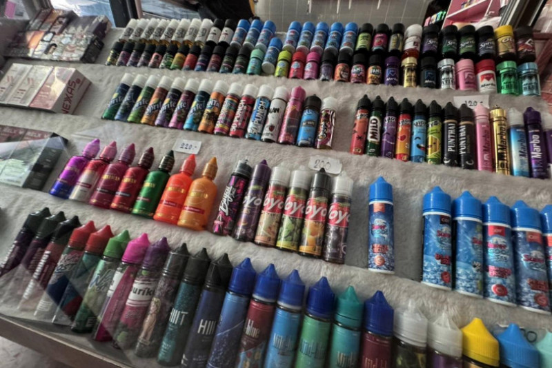 E-cigarette liquid bottles of various flavours are seen at a store in Bangkok. They were later seized by the Customs Department, as e-cigarettes are illegal in Thailand. The Customs Department