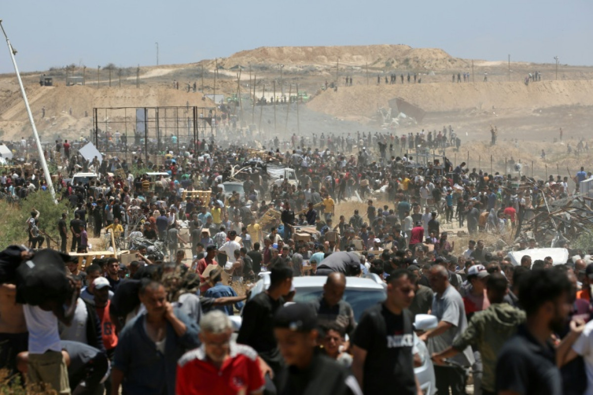 Bangkok Post - Gaza rescuers say Israeli fire kills 10 near aid site as ...