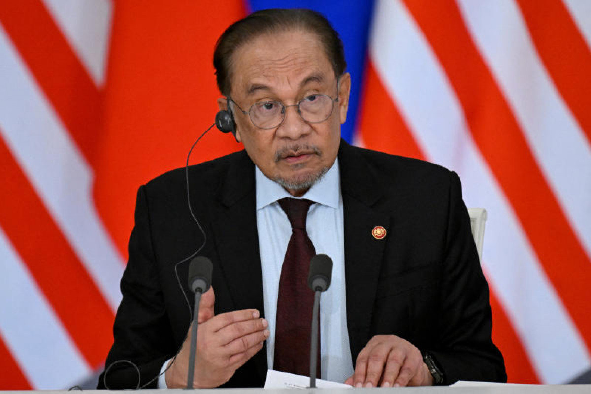 Bangkok Post - Malaysia's Anwar faces more challenges even as lawsuit ...