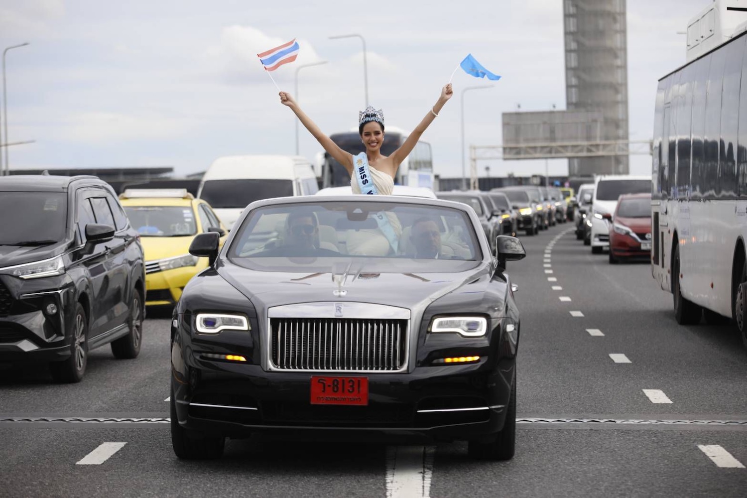 A Rolls-Royce Dawn takes Miss World from the airport to her homecoming parade.