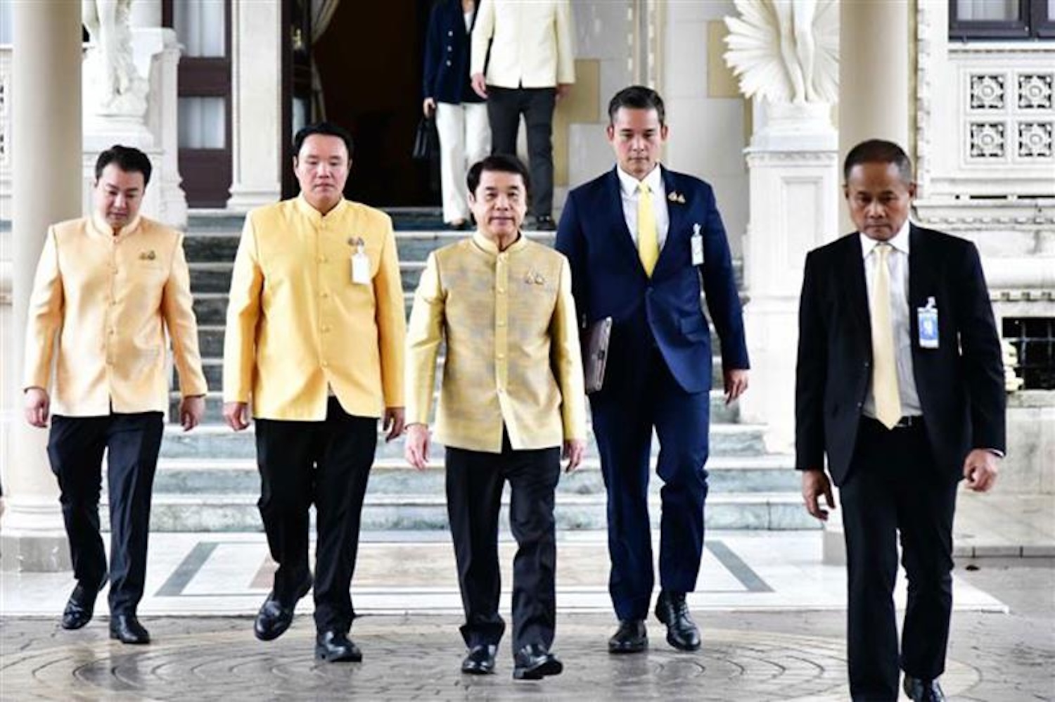 Just standing in: Acting Prime Minister Suriya Jungrungreagkit (centre) is seen at Government House on Wednesday. He is expected to lead new cabinet ministers in a swearing-in ceremony on Thursday instead of suspended PM Paetongtarn Shinawatra. However, once the ceremony ends, Phumtham Wechayachai will become acting PM by virtue of his new role as interior minister. (Photo: Government House)