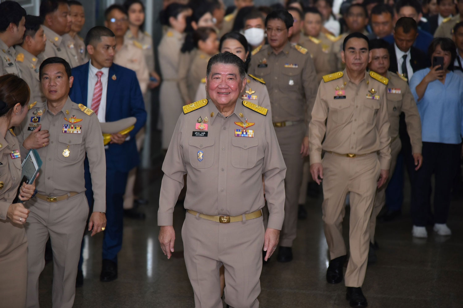 Interior Minister Phumtham Wechayachai arrives at the ministry on Friday to present policies to senior officials and provincial governors nationwide on his first official day in the role at the ministry. (Photo: Interior Ministry)  