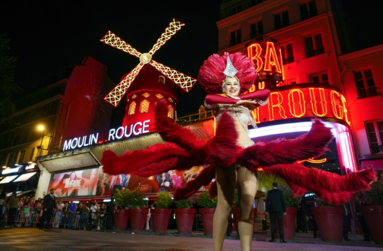 Moulin Rouge windmill twirls again 14 months after accident