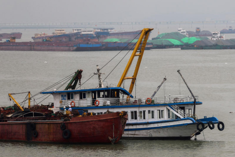Vietnam hunts 4 missing after sudden thunderstorm capsized tourist boat