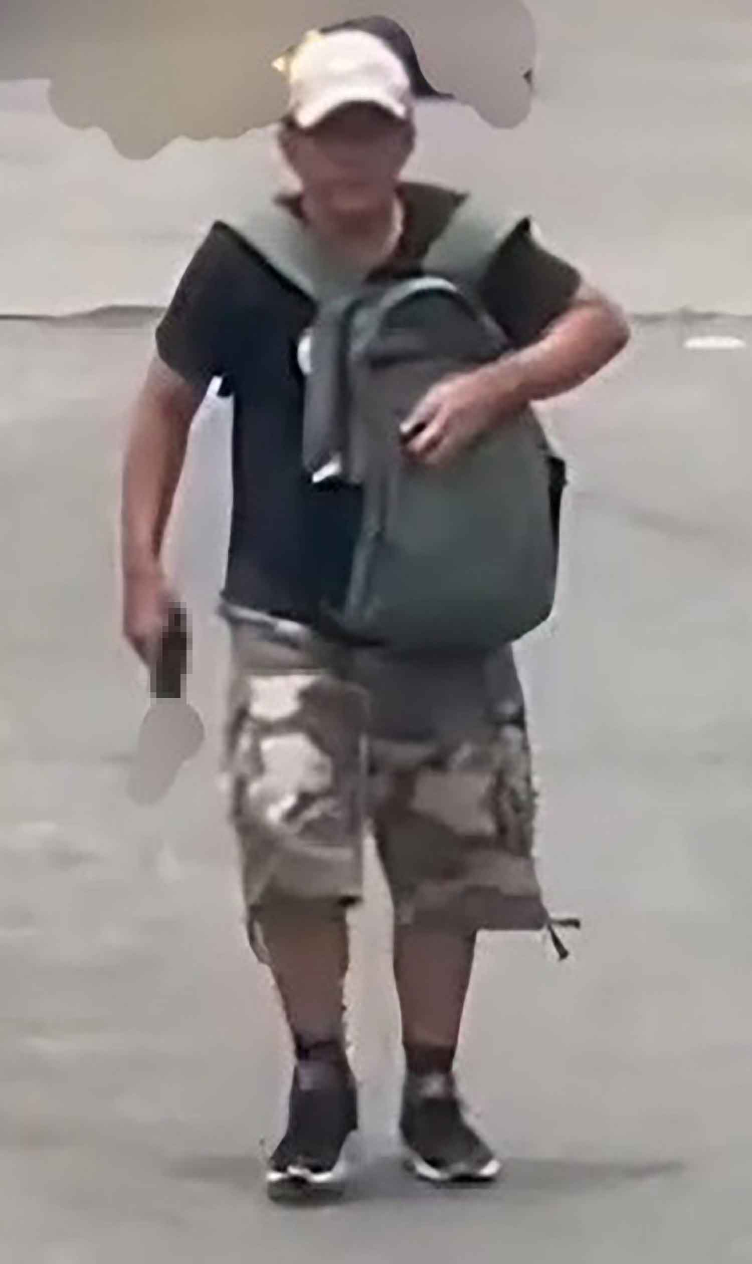 The gunman was captured in a video clip during the shooting incident at the Or Tor Kor market in Chatuchak district, Bangkok, on Monday.
