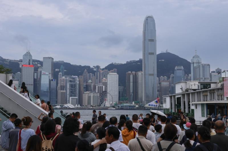 People gather at Victoria Harbour. Hong Kong has logged a 12% increase in tourist arrivals between January and June this year. (Photo: South China Morning Post)
