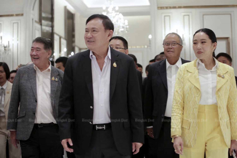 Thaksin Shinawatra arrives at a coalition parties dinner with his daughter, suspended Prime Minister Paetongtarn Shinawatra, at a Bangkok hotel on July 22. (Photo: Pornprom Satrabhaya)