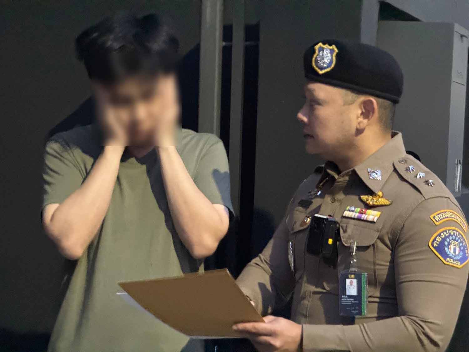 Police arrest Seksan 'Mor Bee' Sapsubbsakul on Tuesday morning. (Police photo)