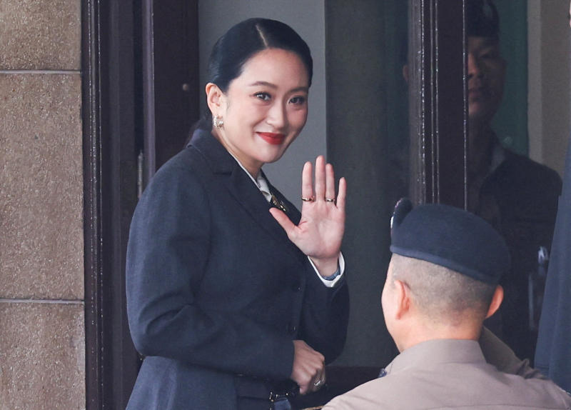 Suspended Thai Prime Minister Paetongtarn Shinawatra arrives at Government House in Bangkok on Friday, ahead of the Constitutional Court's verdict in a high-profile ethics case, following a leaked phone conversation between her and Cambodia's former leader Hun Sen. (Reuters photo)