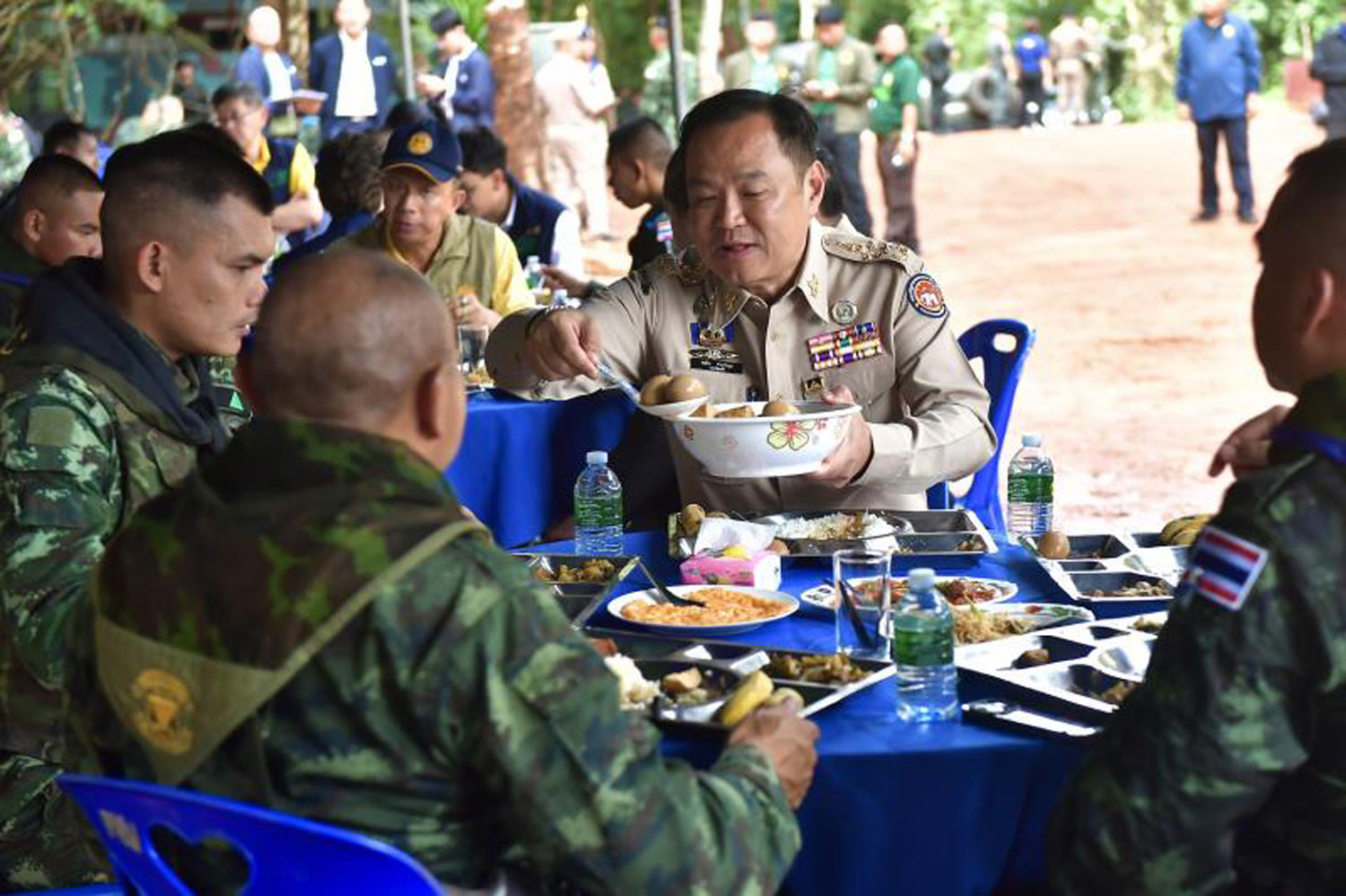 Serving soldiers:Prime Minister Anutin Charnvirakul joins soldiers of the 21st Infantry Battalion, Suranaree Force, for lunch inPhanom Dong Rak district in Surin on Friday. (Photo: Government House)