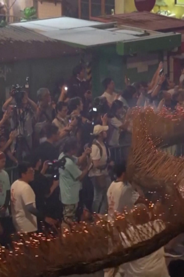 Hong Kong's Fire Dragon Dance ignites festival spirit
