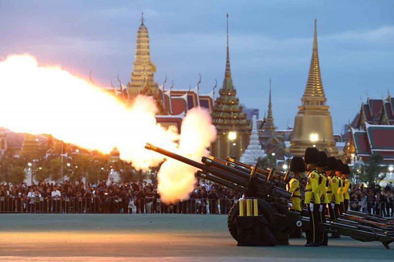 Members of the Royal Thai Army fire a cannon salute outside the Grand Palace, after the body of Thailand's Queen Mother Sirikit was transferred there from King Chulalongkorn Memorial Hospital following her death, in Bangkok, Thailand, October 26, 2025. REUTERS
