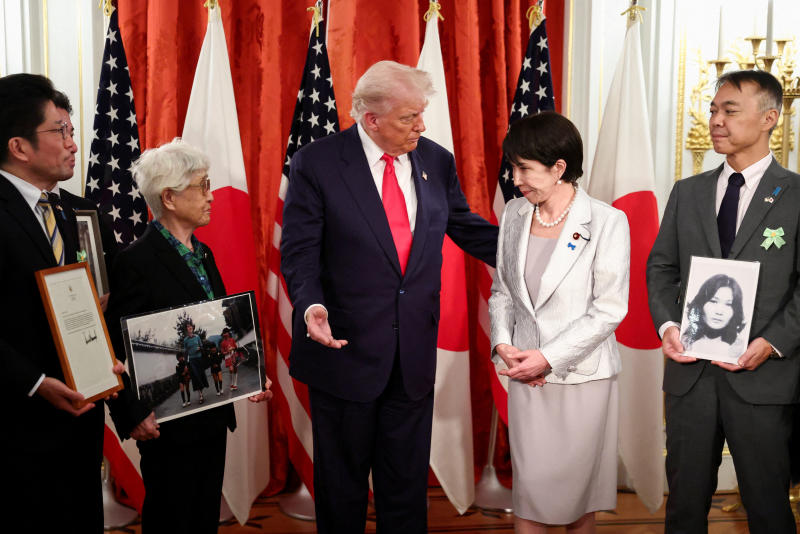 US President Donald Trump gestures next to Japanese Prime Minister Sanae Takaichi, as he meets the families of Japanese nationals abducted by North Korea in the 1970s and 1980s, at Akasaka Palace in Tokyo, Japan, on Tuesday. (Photo: Reuters)