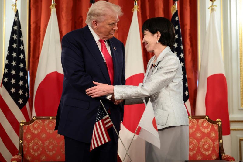 US President Donald Trump, left, shakes hands with Japanese Prime Minister Sanae Takaichi during a bilateral meeting at Akasaka Palace in Tokyo, Japan, on Tuesday. (Photo: Reuters)